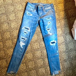 AMERICAN EAGLE SUPER STRETCH SUPER LOW JEGGING SIZE 6, LIKE NEW